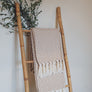 Plaid à franges, en coton beige et écru, motifs Losanges